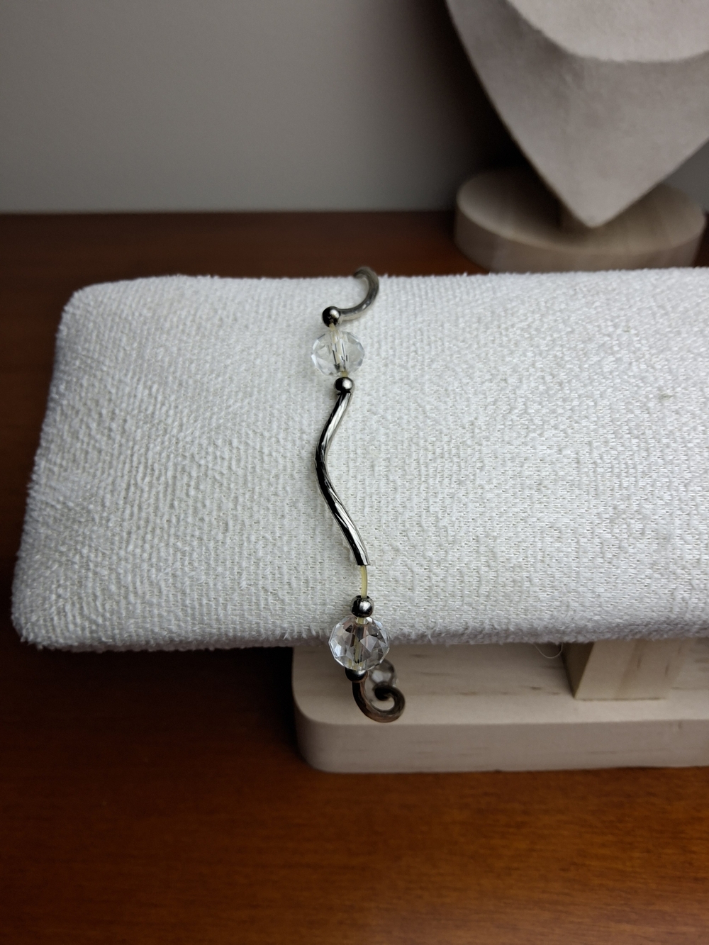 Silver Tone Wavy Crystal Accent Bracelet - Clear